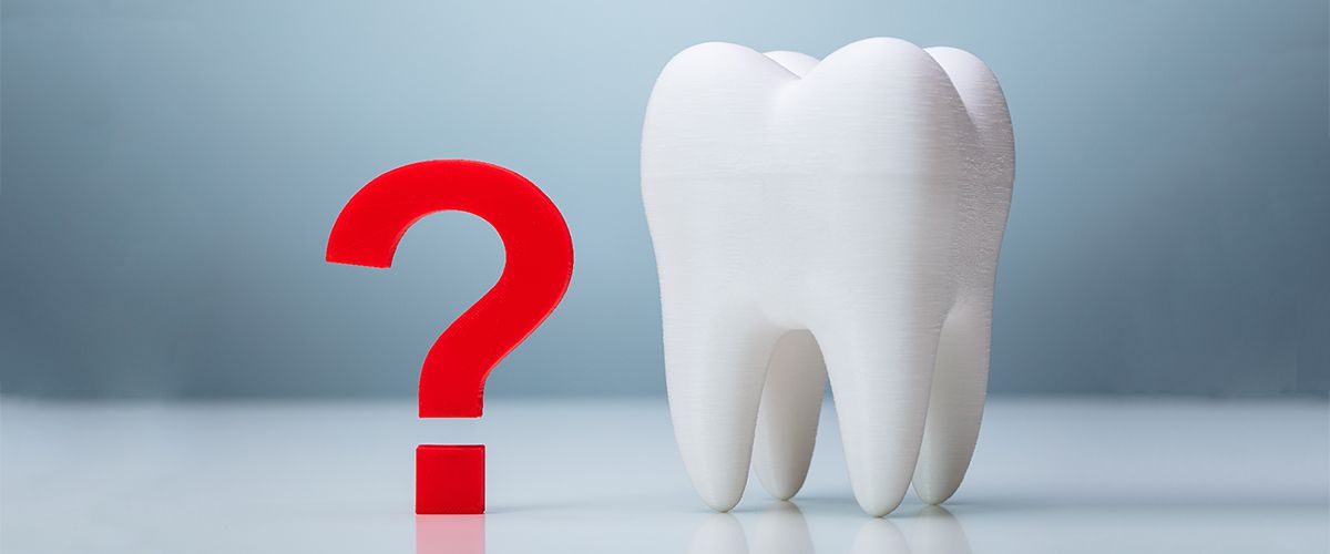 Чому утворюється наліт на зубах?